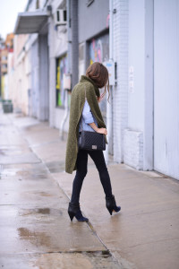 walking around with black pants, iro ankle booties and a black channel