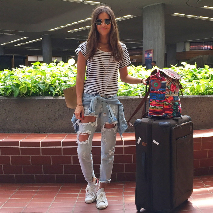 blank itinerary travel outfit wearing one teaspoon jeans, isabel marant tennis shoes and a striped t shirt